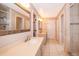 Bright bathroom with double vanity and large mirror at 808 N Shore Dr, Leesburg, FL 34748