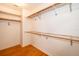 Large walk-in closet with double hanging rods at 808 N Shore Dr, Leesburg, FL 34748