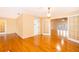 Living room with hardwood floors and French doors at 808 N Shore Dr, Leesburg, FL 34748