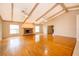 Bright living room with hardwood floors, high ceilings, and fireplace at 808 N Shore Dr, Leesburg, FL 34748