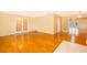 Hardwood floors and French doors open to another room at 808 N Shore Dr, Leesburg, FL 34748