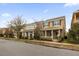 Two-story townhome with front porch and landscaping at 8468 Powder Ridge Trl, Windermere, FL 34786