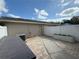 Private backyard featuring a brick paver patio and white vinyl fencing at 8634 Danforth Dr, Windermere, FL 34786