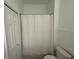 Bathroom with a shower featuring a simple white curtain at 8634 Danforth Dr, Windermere, FL 34786