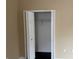 Bedroom closet with bifold doors and shelving at 8634 Danforth Dr, Windermere, FL 34786