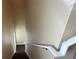 Carpeted staircase with white railing, leading to the upper level at 8634 Danforth Dr, Windermere, FL 34786