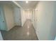Home entryway with tiled floor and bright neutral colored walls at 8864 Sw 49Th Cir, Ocala, FL 34476