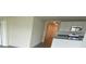 Kitchen featuring an island with a sink and modern appliances at 8864 Sw 49Th Cir, Ocala, FL 34476