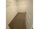 Spacious walk-in closet with wire shelving and carpet at 8864 Sw 49Th Cir, Ocala, FL 34476