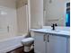 Clean bathroom with a tub, toilet and vanity with modern faucet at 911 N Orange Ave # 127, Orlando, FL 32801