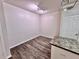 Bright dining area with wood-look floors and neutral walls at 911 N Orange Ave # 127, Orlando, FL 32801