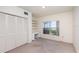 Bedroom with double doors and built-in shelves at 951 Powhatan Dr, Sanford, FL 32771