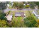 Property overview showing house, shed, and surroundings at 9877 7Th Ave, Orlando, FL 32824