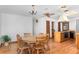 Dining area with a round table and chairs, near kitchen at 9877 7Th Ave, Orlando, FL 32824