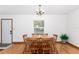 Dining room with wood table and chairs at 9877 7Th Ave, Orlando, FL 32824