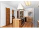 Kitchen with an island, stainless steel appliances, and wood cabinets at 9877 7Th Ave, Orlando, FL 32824