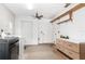 Laundry room with washer, dryer, and shelving units at 9877 7Th Ave, Orlando, FL 32824