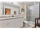 Modern bathroom with a double vanity and a large walk-in shower at 9979 Schroeder Aly, Winter Garden, FL 34787