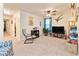 Gathering room with a comfortable chair, TV, and ample board games at 9979 Schroeder Aly, Winter Garden, FL 34787