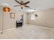 Bright dining area with tile floors and a view of the kitchen at 1018 Bear Lake Rd, Apopka, FL 32703