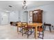 Bright dining area with wood floors and a view of the entryway at 1018 Bear Lake Rd, Apopka, FL 32703