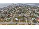 Aerial view of a single Gathering home close to the beach and city at 1030 Bel Aire Dr, Daytona Beach, FL 32118