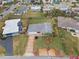 Aerial view of single-Gathering home with large yard, located in a residential neighborhood at 1030 Bel Aire Dr, Daytona Beach, FL 32118