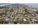 Aerial view showing home and surrounding neighborhood near the coast at 1030 Bel Aire Dr, Daytona Beach, FL 32118