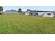 Expansive grassy backyard, perfect for outdoor activities at 1030 Bel Aire Dr, Daytona Beach, FL 32118