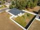 Aerial view showing a house with a fenced backyard at 108 Alexandria Cir, Deland, FL 32724