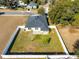 Aerial view of house with fenced backyard at 108 Alexandria Cir, Deland, FL 32724