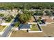 Aerial view of a house and surrounding neighborhood at 108 Alexandria Cir, Deland, FL 32724