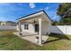 Covered patio with ceiling fan, adjacent to house at 108 Alexandria Cir, Deland, FL 32724