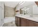 Bathroom boasts double vanity and a bathtub at 108 Alexandria Cir, Deland, FL 32724