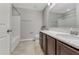 Clean bathroom with single vanity and tub shower combo at 108 Alexandria Cir, Deland, FL 32724