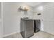 Bright laundry room, featuring modern washer and dryer at 108 Alexandria Cir, Deland, FL 32724