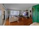 Bright living room with hardwood floors and sliding glass doors at 117 Temple St, Deland, FL 32720