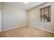 Simple bedroom with neutral walls and carpeted floors at 14020 Bradbury Rd, Orlando, FL 32828