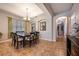 Formal dining room with dark wood table and six chairs at 14020 Bradbury Rd, Orlando, FL 32828