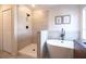 Spa-like bathroom featuring a large soaking tub and walk-in shower at 14217 Sapphire Bay Cir, Orlando, FL 32828