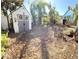 Large backyard with shed and landscaping at 154 Woodbury Pines Cir, Orlando, FL 32828