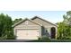 One-story home with a two-car garage and attractive landscaping at 1589 Bull Hill Rd, Kissimmee, FL 34744