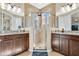 Elegant bathroom with a double vanity and a large shower at 161 Old Moss Cir, Deland, FL 32724