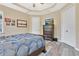 Bright bedroom featuring a comfortable bed and ample closet space at 161 Old Moss Cir, Deland, FL 32724