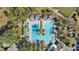 Large community pool with surrounding lounge area at 161 Old Moss Cir, Deland, FL 32724