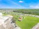 Community playground with park benches and landscaping at 1735 Three Bars Rd, Kissimmee, FL 34744