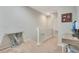 Upstairs hallway with a desk, console table, and carpeted flooring at 190 Mitchell Creek Way, Oviedo, FL 32765