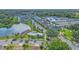 Aerial view of townhouses near community pool at 2102 Gopher Tortoise Ter, Oakland, FL 34787