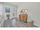 Entryway with wood console table, mirrors, and a side table at 2102 Gopher Tortoise Ter, Oakland, FL 34787