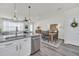 Kitchen with granite island, stainless steel appliances, and open layout at 2102 Gopher Tortoise Ter, Oakland, FL 34787